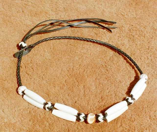 26_1-1.jpg - Braided choker with bone beads and braided knots .
Lovely peice made by Kerri.